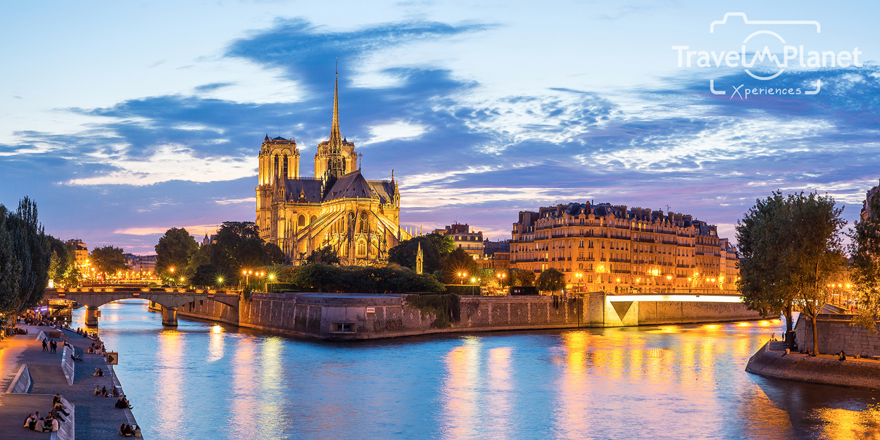 Notre Dame Cathedral with Paris cityscape panorama at dusk, France